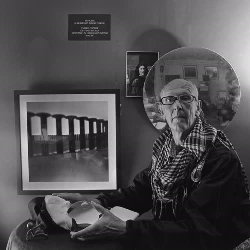 <body>
 <p>
  This series,<i> Self-portrait, after Poussin</i> explores how we see ourselves over time. The plaster mask is a self-portrait made years ago: it represents the past self, fixed and unchanging. The round glass lens stands for photography and the present moment, always shifting with light. The mirror shows that identity is never just individual but always in relation to others.
 </p>
 <p>
In the 1649 painting, Poussin included statuary and a ring referencing Stoic philosophy. Stoicism taught that life is shaped by time, change, and the need to accept what is beyond our control. Poussin used these icons to show himself not only as an artist, but also as someone seeking wisdom in a changing world.
 </p>
 <p>
In today’s age, these ideas still feel relevant. The plaster mask recalls memory and permanence, but the lens and mirror suggest the constant flux of the present and our ties to others. Like the Stoics, the project reflects on how we live with change and find steadiness in self-understanding. Philosopher Paul Ricoeur’s writings on identity deepen this reflection: we are at once the same person over time and always becoming someone new.
 </p>
</body>
 Images Copyright Aldobranti® ©2008-'2025. All rights reserved.